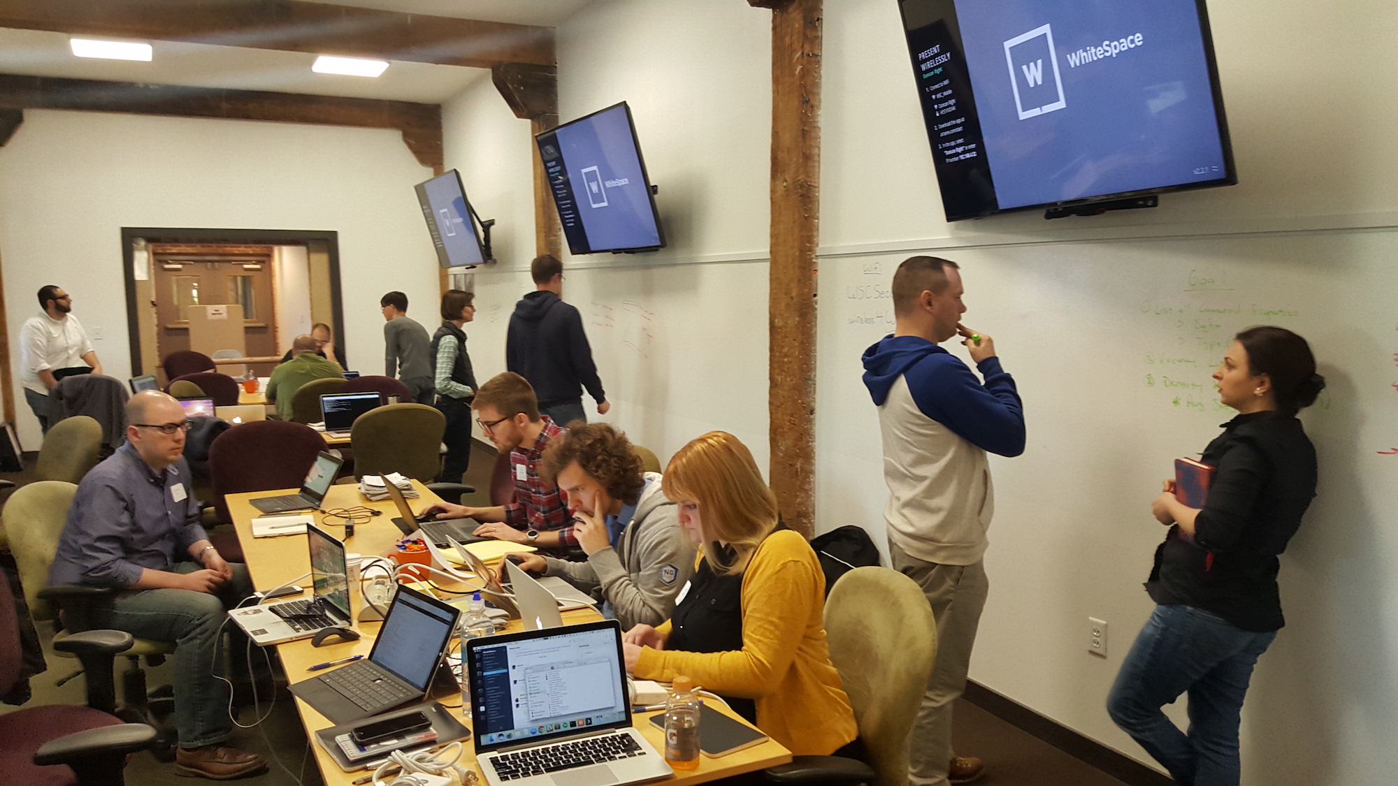 Teams working during the hackathon